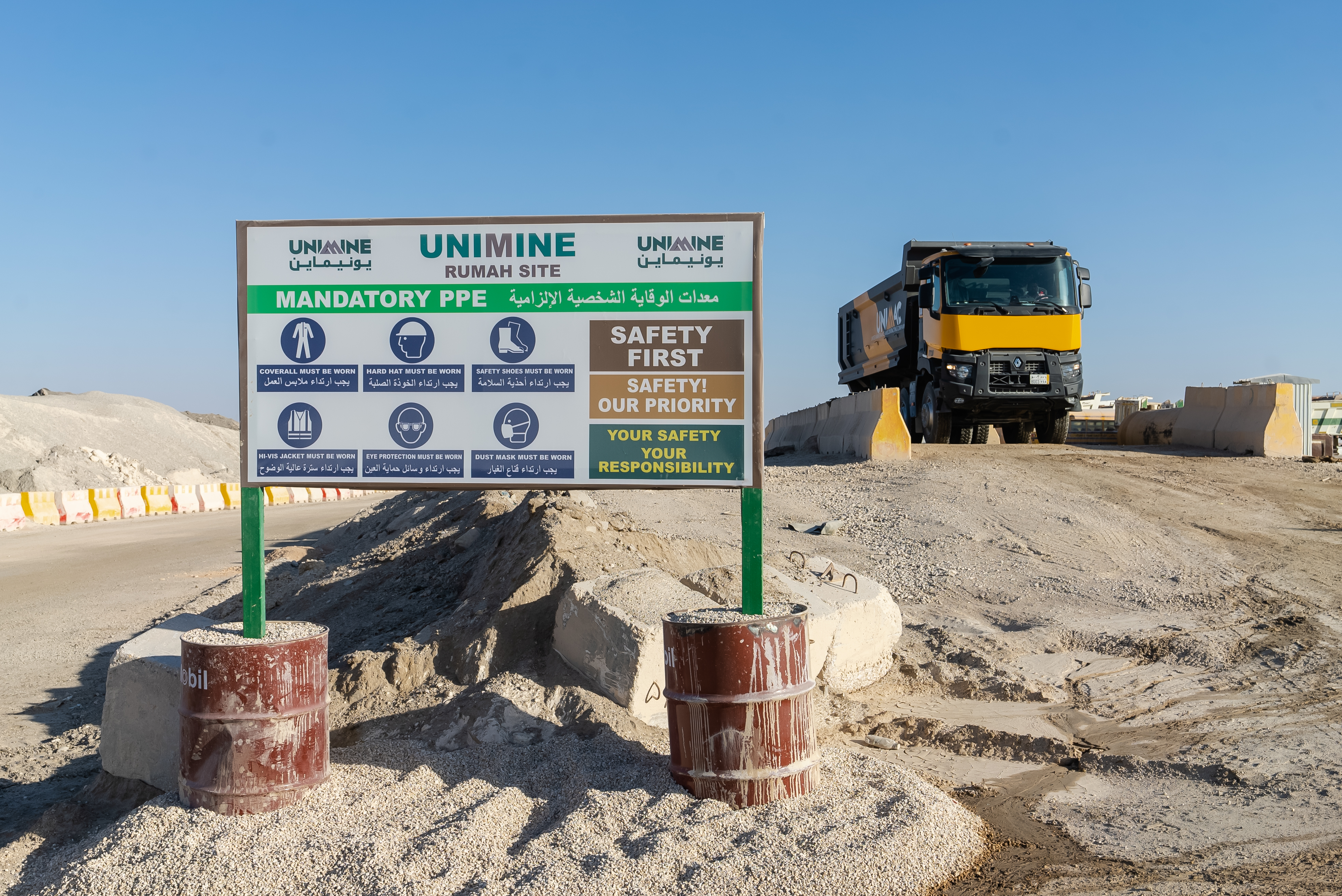 UNIMINE Rumah Site mandatory PPE signage